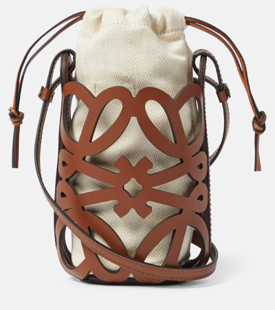 Loewe + Paula's Ibiza Cutout Leather And Herringbone Canvas Shoulder Bag In Brown
