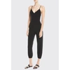 Norma Kamali Fara Crossover-strap Jersey Jumpsuit In Black
