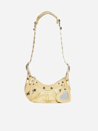 Balenciaga Xs Le Cagole Leather Shoulder Bag In Butter Yellow
