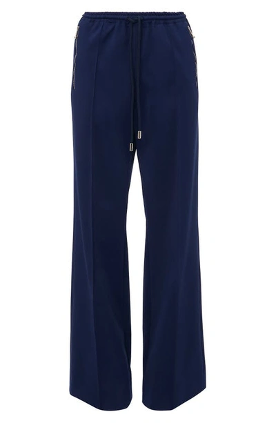 Jw Anderson Bootcut Track Pants In Blue