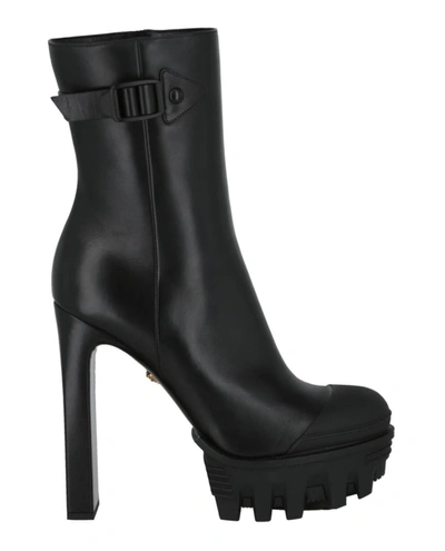 Versace Platform Logo Heeled Boots In Black