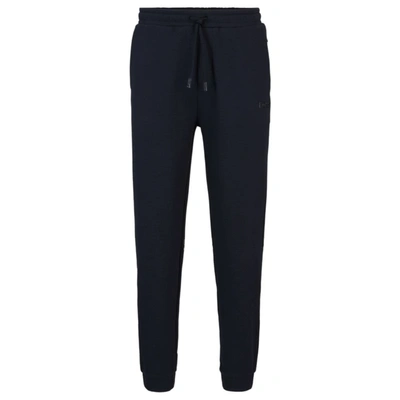 Hugo Boss Cotton-terry Loungewear Tracksuit Bottoms With Embossed Logo In Dark Blue