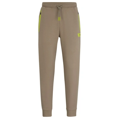 Hugo Boss Cotton-blend Tracksuit Bottoms With Logo Stripe In Green
