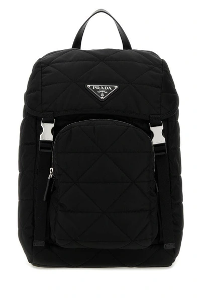Prada Logo Plaque Padded Backpack In Black