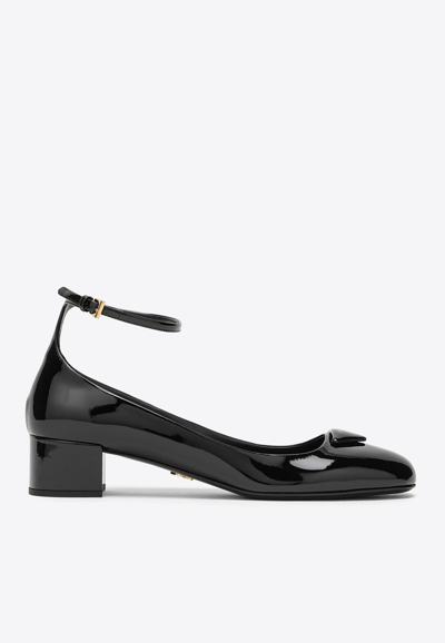 Prada 35 Logo-appliqué Patent Leather Pumps In Black