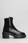 STUART WEITZMAN 5050 SOHO BOOTIE COMBAT BOOTS IN BLACK LEATHER