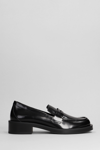 STUART WEITZMAN PALMER BOLD LOAFERS IN BLACK PATENT LEATHER