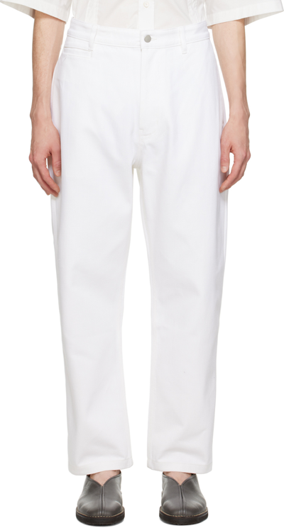 Studio Nicholson Tannaro Tapered-leg Jeans In White