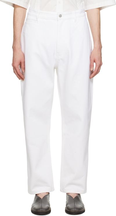 Studio Nicholson Washed Tapered Denim Jeans In White