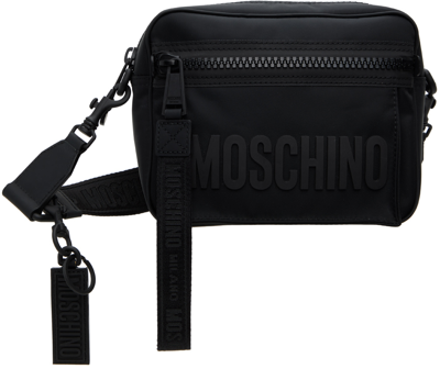 Moschino Embossed Signature Crossbody Bag In Black