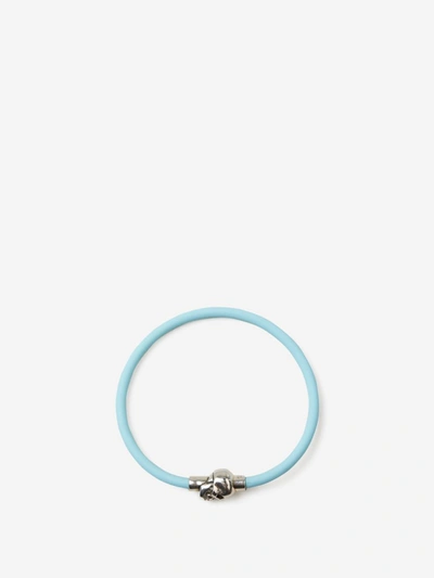 Alexander Mcqueen Blue Rubber Cord Skull Bracelet In Light Blue