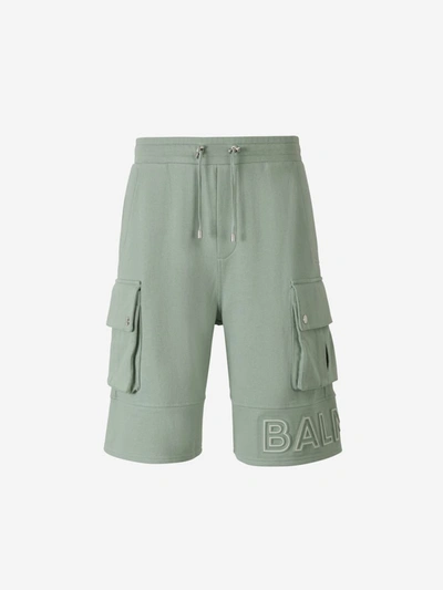 Balmain Embossed-logo Cotton Bermuda Shorts In Green