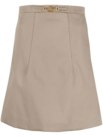 Patou Logo-plaque High-waisted Skirt In Beige