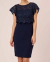 ADRIANNA PAPELL SEQUINED GUIPURE LACE POPOVER SHEATH DRESS IN NAVY