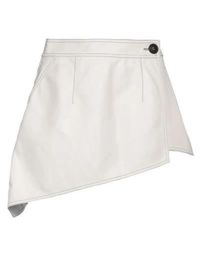 Materiel Contrast-stitch Asymmetric Miniskirt In White