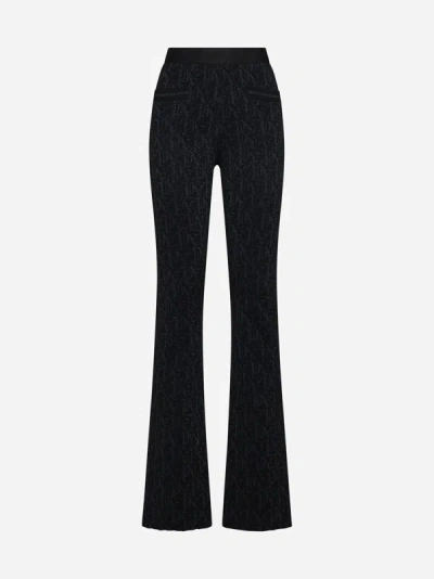 Palm Angels Monogram-jacquard Knitted Flared Trousers In Black
