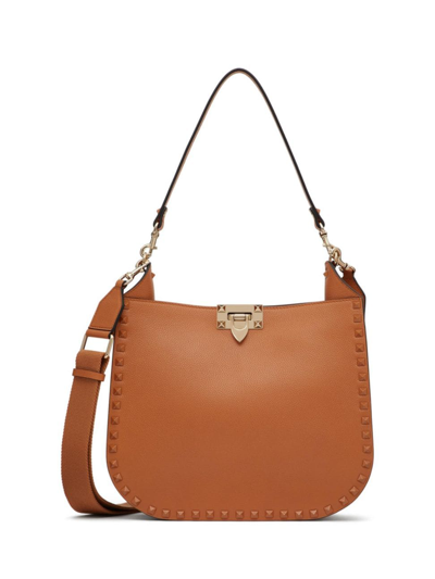 Valentino Garavani Calfskin Rockstud Hobo Bag With Ribbon Strap In Beige