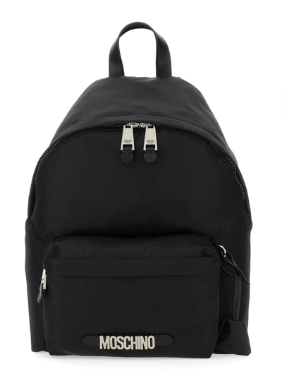 Moschino Logo Plaque Backpack In Black
