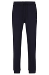 Hugo Boss Cotton Tracksuit Bottoms With Curved Logo In Dark Blue