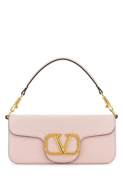Valentino Garavani Handbags. In Pink