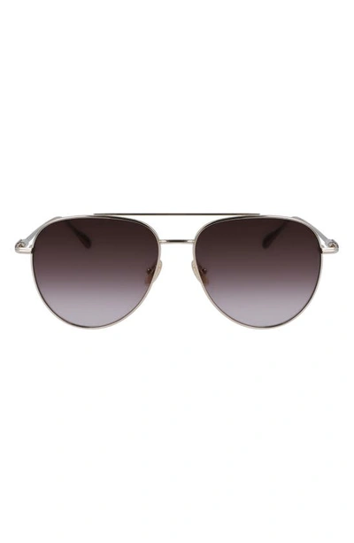 Ferragamo Men's Gancini Evolution Metal Aviator Sunglasses In Gold/brown Gradie