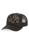 Amiri Staggered Logo Trucker Hat In Black/ Alabaster