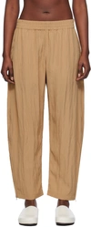 Studio Nicholson Tan Toba Trousers In Sand