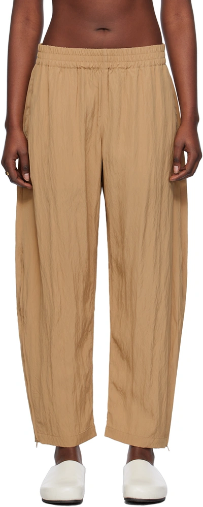 Studio Nicholson Tan Toba Trousers In Sand