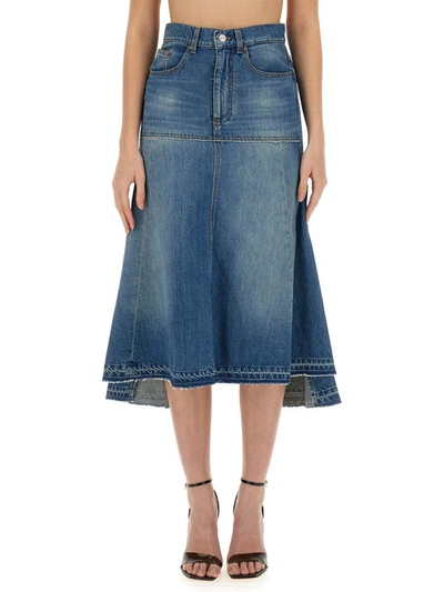 Victoria Beckham Flared Denim Midi Skirt In Medium Wash
