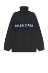 Balenciaga Oversized Logo-print Colour-block Shell Jacket In Black