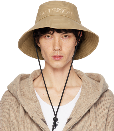 Jw Anderson Logo-embroidered Cotton Bucket Hat In Nude