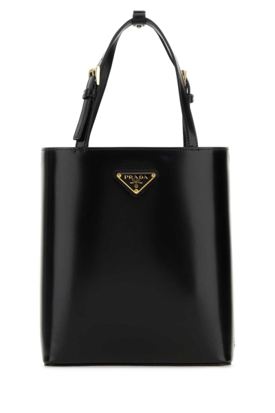 Prada Triangle Logo Plaque Cylinder Shaped Tote Bag In Nero