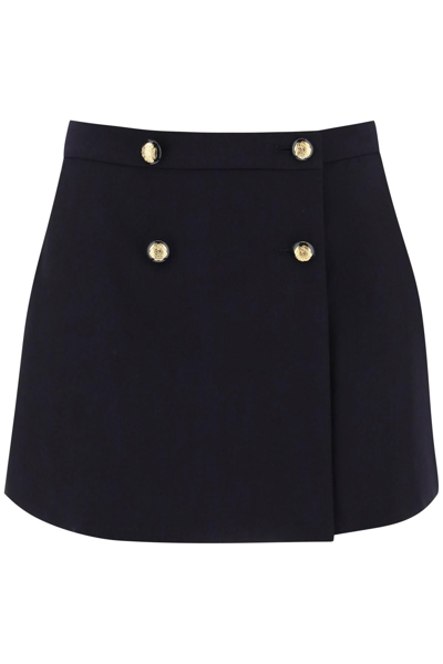 ALEXANDER MCQUEEN ALEXANDER MCQUEEN MINI WRAP SKIRT WITH SEAL BUTTONS