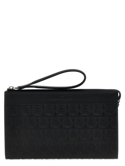 Ferragamo Logo Clutch Bag In Black