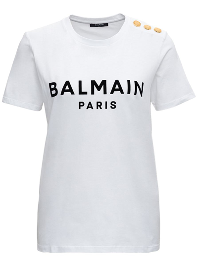 BALMAIN WHITE CREWNECK T-SHIRT WITH LOGO PRINT AND GOLDEN BUTTONS IN JERSEY WOMAN