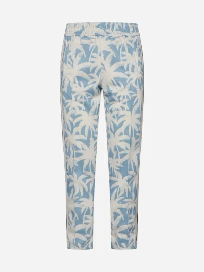 Palm Angels All-over Palms Print Track Pants In Light Blue,off White