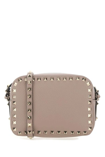Valentino Garavani Woman Antiqued Pink Leather Rockstud Crossbody Bag
