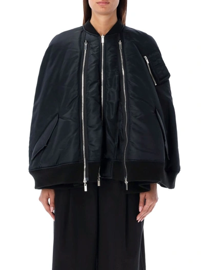 Noir Kei Ninomiya Zipped Padded Cape In Black