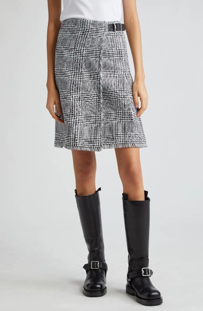 BURBERRY WARPED HOUNDSTOOTH FRINGE TRIM WRAP SKIRT