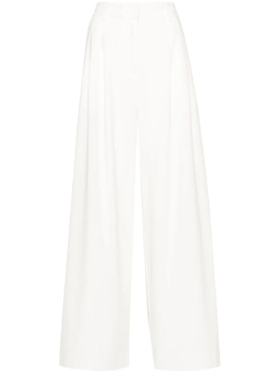 Remain Flare Trousers In White