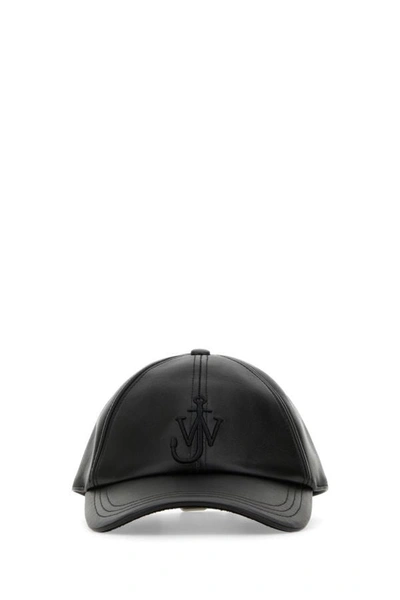 Jw Anderson Logo Debossed Baseball Leather Cap In Black