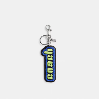 Coach The Lil Nas X Drop Bag Charm In Silver/yelllow