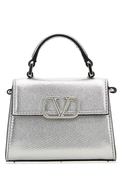 Valentino Garavani Handbags. In Silver