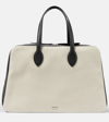 KHAITE MAEVE LARGE CANVAS AND LEATHER DUFFEL BAG