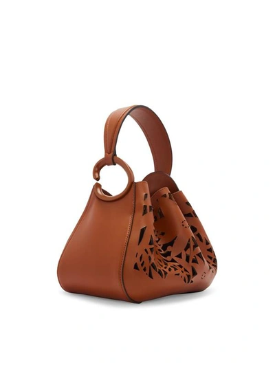 Oscar De La Renta Laser Cut O Handle Bag In Coffee