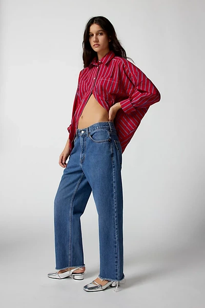 Urban Renewal Remade Levi's Raw Cut Hem Jean In Vintage Denim Medium At Urban Outfitters