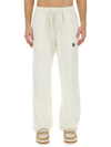 PALM ANGELS PALM ANGELS MONOGRAM EMBROIDERED DRAWSTRING PANTS