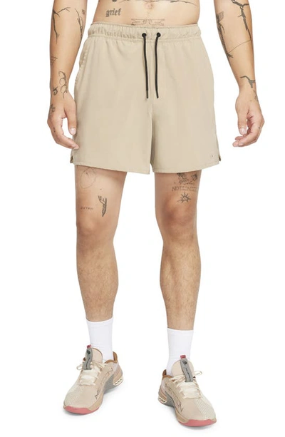 Nike Men's Unlimited Dri-fit 5" Unlined Versatile Shorts In Khaki/black/khaki