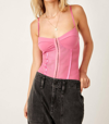 FREE PEOPLE NIGHT RHYTHM CORSET BODYSUIT IN PINK