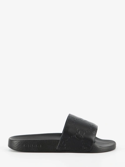 Gucci Gg Slider Sandals In Black